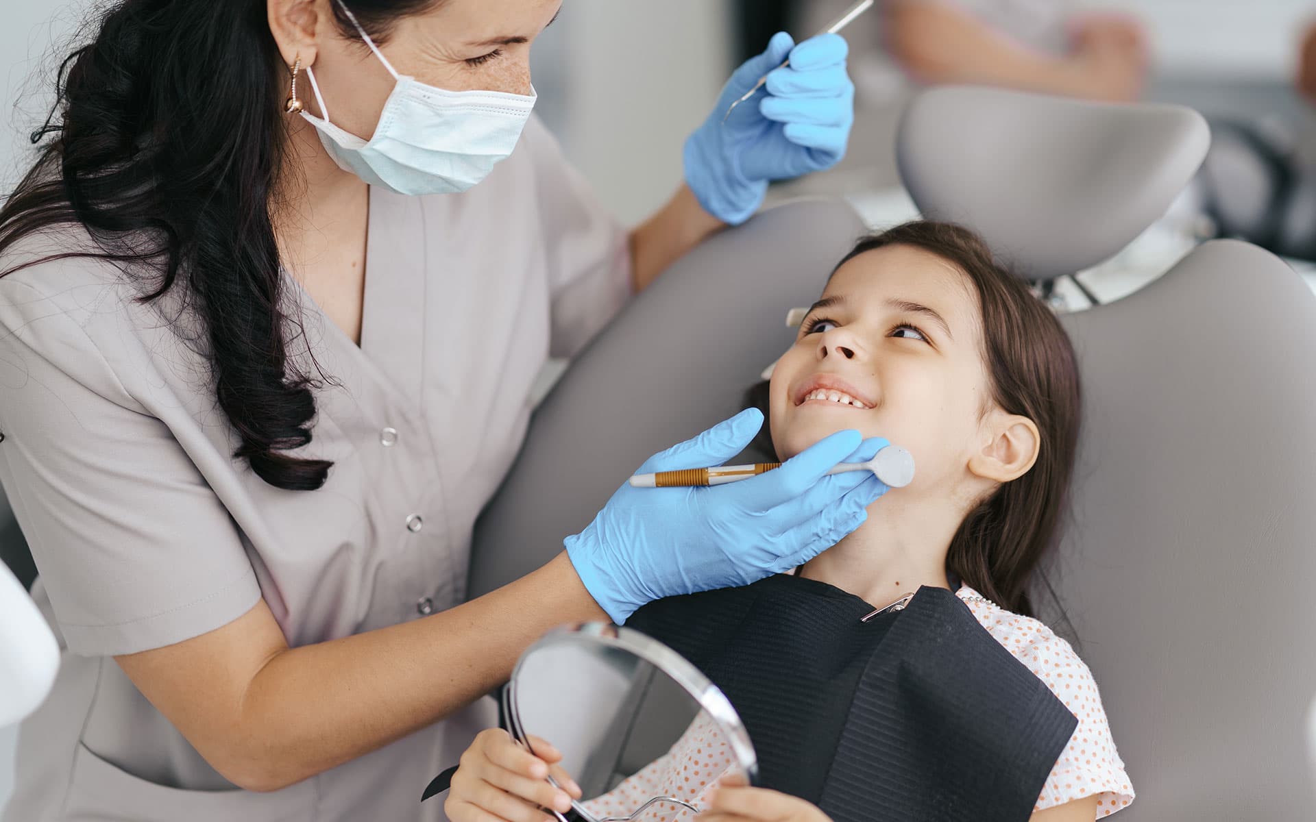 Smiling patient at Magnum Dental Clinic